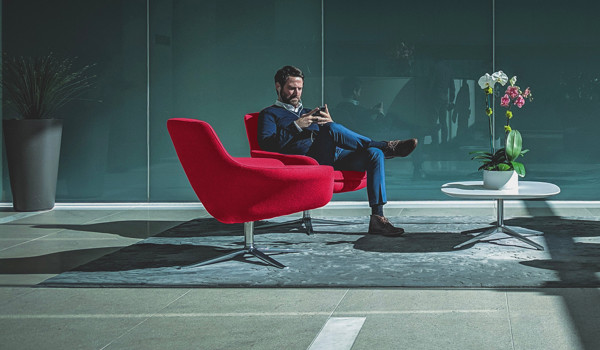 Man in red chair